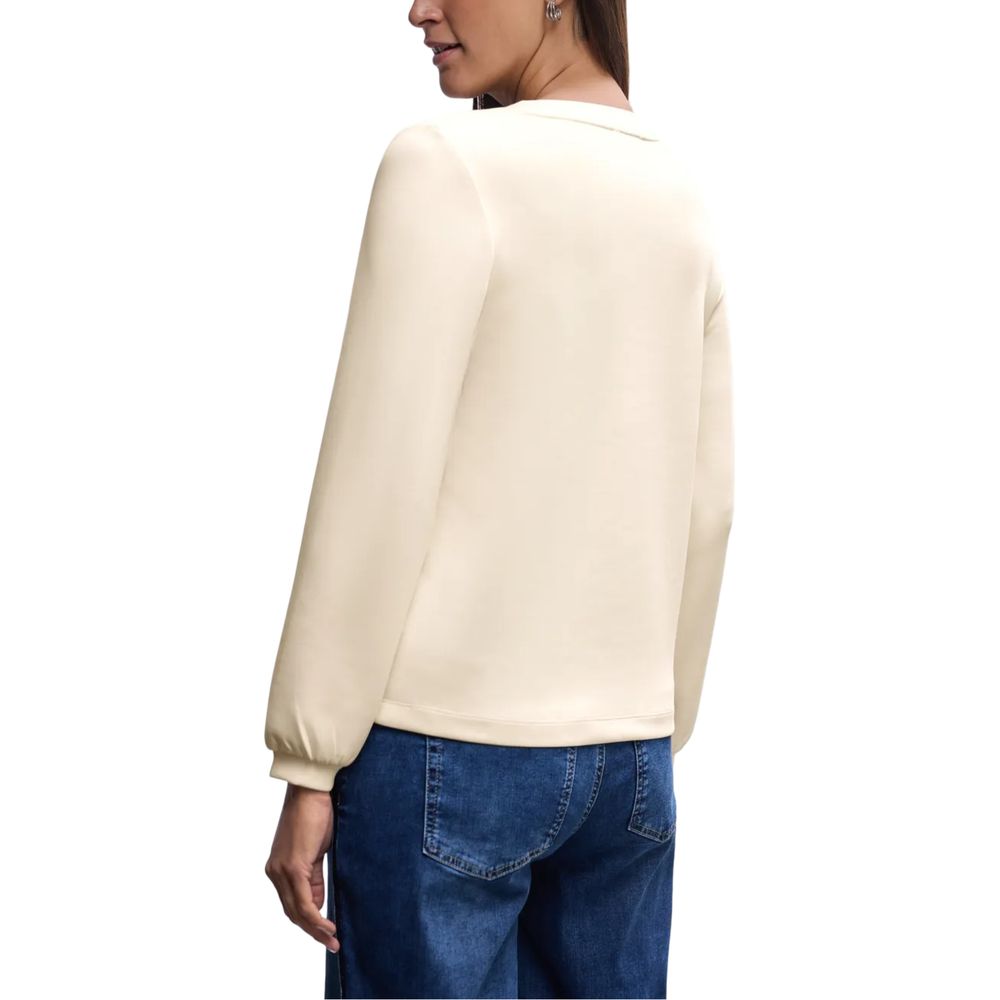 Activewear Sweatshirt by Street One for women in stretch lycra modal & silk beige showcases a athletic silhouette with sleeves, a athletic v-neck crew neckline, and high-performance for a athletic aesthetic.