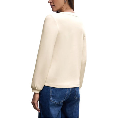 Activewear Sweatshirt by Street One for women in stretch lycra modal & silk beige showcases a athletic silhouette with sleeves, a athletic v-neck crew neckline, and high-performance for a athletic aesthetic.