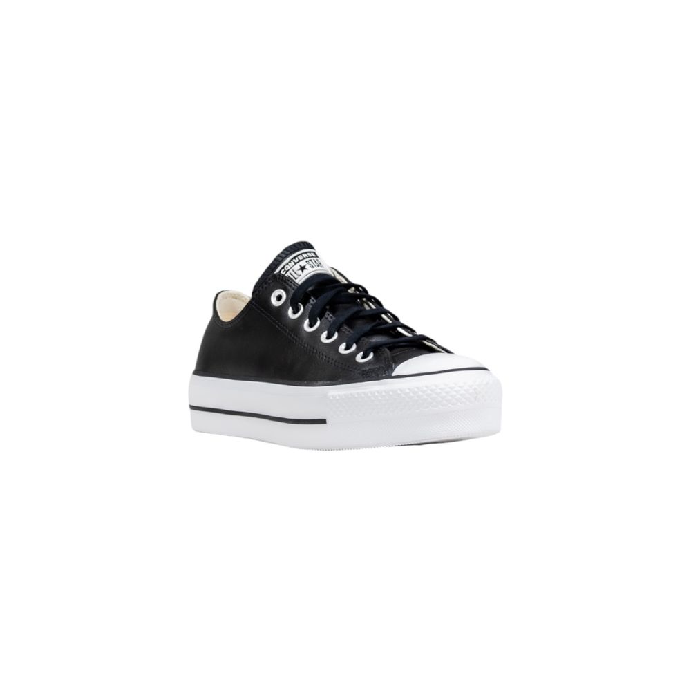 Sneakers by Converse for women in leather & rubber black presents a sumptuous silhouette from the Women's Low-Top Casual Leather & Rubber Sneakers collection, showcasing a sumptuous low-top casual style for an elevated aesthetic.