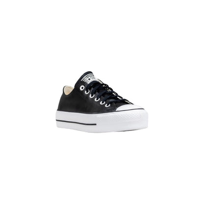 Sneakers by Converse for women in leather & rubber black presents a sumptuous silhouette from the Women's Low-Top Casual Leather & Rubber Sneakers collection, showcasing a sumptuous low-top casual style for an elevated aesthetic.