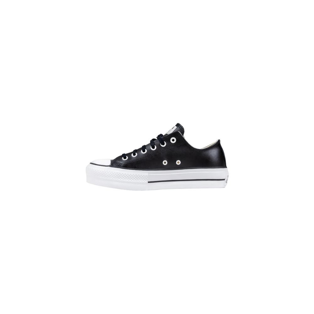 Sneakers by Converse for women in leather & rubber black features an sumptuous design from the Women's Low-Top Casual Leather & Rubber Sneakers collection, highlighting a sumptuous low-top casual style for a premium, high-fashion look.