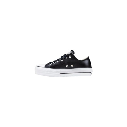 Sneakers by Converse for women in leather & rubber black features an sumptuous design from the Women's Low-Top Casual Leather & Rubber Sneakers collection, highlighting a sumptuous low-top casual style for a premium, high-fashion look.