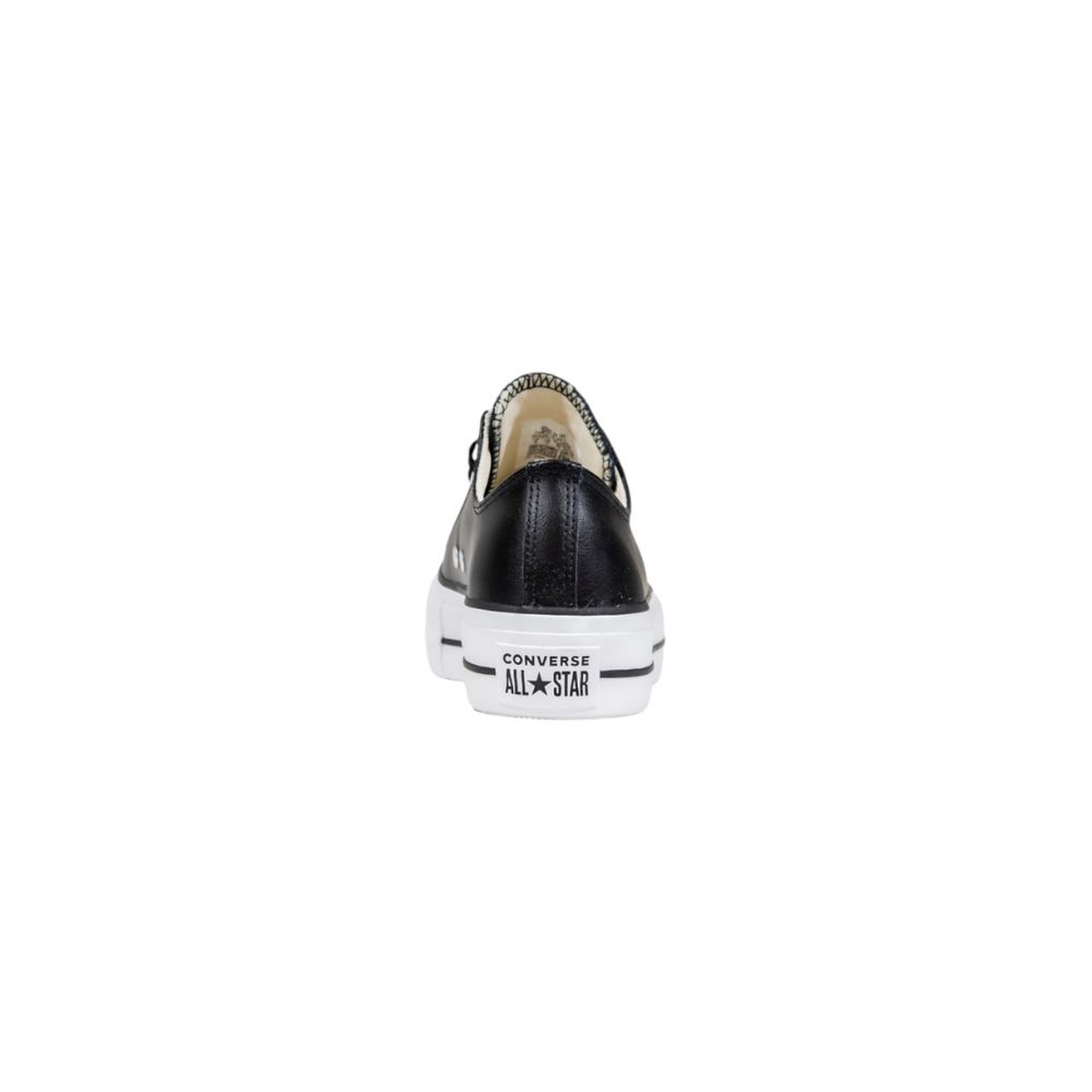 Sneakers by Converse for women in leather & rubber black features an opulent silhouette from the Women's Low-Top Casual Leather & Rubber Sneakers collection, showcasing a signature low-top casual style with an opulent finish.