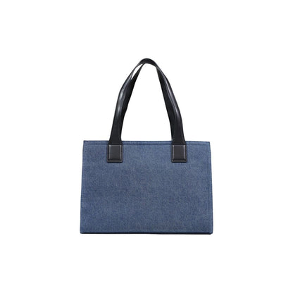 Large Handbag by Love Moschino for women in cotton & faux leather blue & print features a exquisite silhouette, showcasing a secure and exquisite with versatile handle for a exquisite finish.