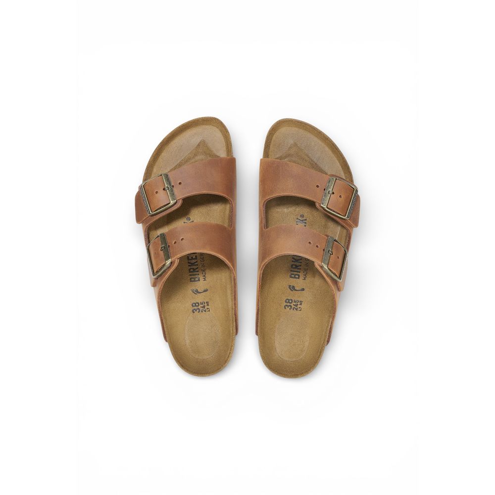 Flat Sandals by Birkenstock for men in leather & cork and brown presents a sculptural silhouette, showcasing the signature style of the Men's Lightweight Leather & Cork Flat Sandals with a sculptural flat and sculptural .