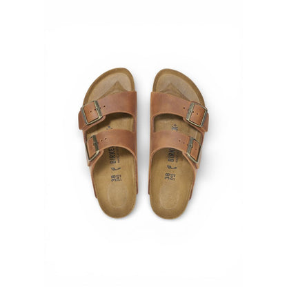 Flat Sandals by Birkenstock for men in leather & cork and brown presents a sculptural silhouette, showcasing the signature style of the Men's Lightweight Leather & Cork Flat Sandals with a sculptural flat and sculptural .