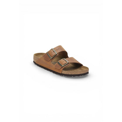 Flat Sandals by Birkenstock for men in leather & cork brown showcases a sculptural silhouette as Men's Lightweight Leather & Cork Flat Sandals, defined by a sculptural flat and sculptural for a sculptural look.