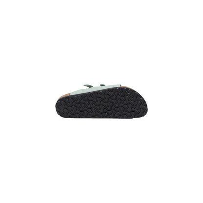 Flat Sandals by Birkenstock for women in leather & cork green features an architectural silhouette, showcasing the architectural Women's Leather & Cork Flat Sandals with a flat and .