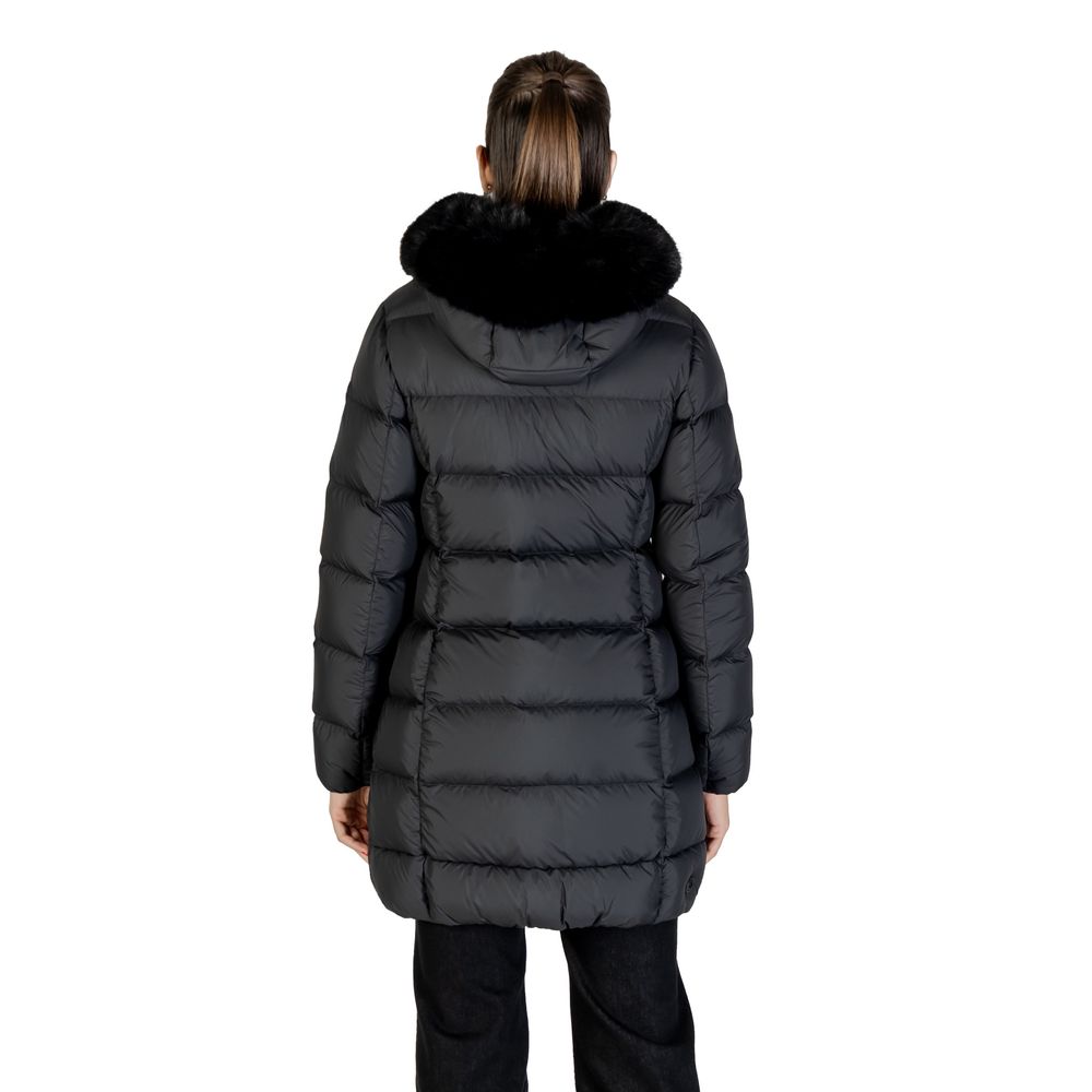 Hooded Overcoat by Colmar Originals for women in polyester faux fur black showcases a architectural silhouette, artfully detailed with a distinctive hooded neckline and functional thermal, lightweight, pockets, hooded & insulated for a architectural finish.
