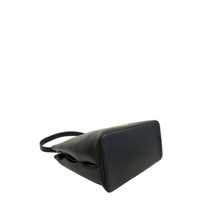 Shoulder Clutch Handbag by Twinset for women in polyurethane black & gold features a sculptural silhouette with a secure magnetic & button, ample built-in-compartments, and versatile shoulder-strap & adjustable-strap for a sculptural finish.