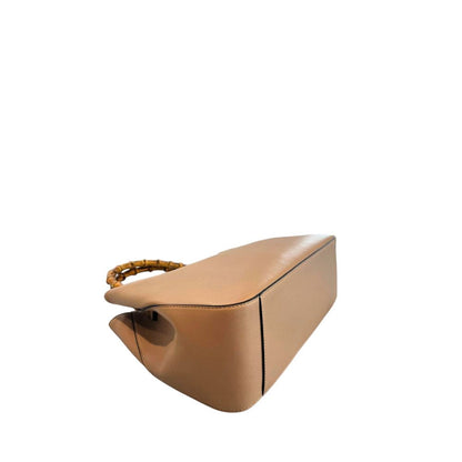 Flap Shoulder Bag by Twinset for women in polyurethane brown & gold features a statuesque silhouette, showcasing a secure flap, magnetic & button and statuesque built-in-compartments with versatile shoulder-strap & adjustable-strap for a statuesque finish.