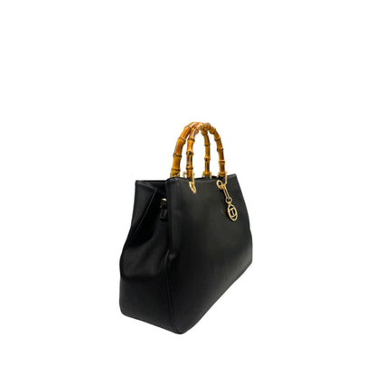 Flap Shoulder Bag by Twinset for women in polyurethane black & gold showcases a statuesque silhouette, artfully detailed with a secure flap, magnetic & button, organized built-in-compartments, and versatile shoulder-strap & adjustable-strap for a statuesque look.