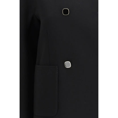 Overcoat by Max Mara for women in acetate & polyester black showcases a enveloping silhouette, detailed with distinctive pockets and a enveloping .