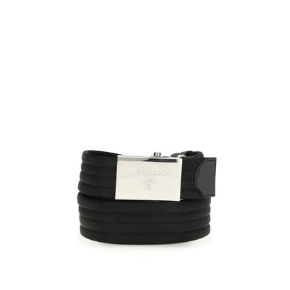 Belt by Prada for men in polyester & nylon black & striped features an artisanal finish, elegantly showcasing the signature style and artisanal craftsmanship of the Polyester & Nylon Belt design.
