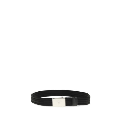 Belt by Prada for men in polyester & nylon black & striped features a versatile silhouette, artfully showcasing the versatile design of the Polyester & Nylon Belt for a sophisticated, premium finish.