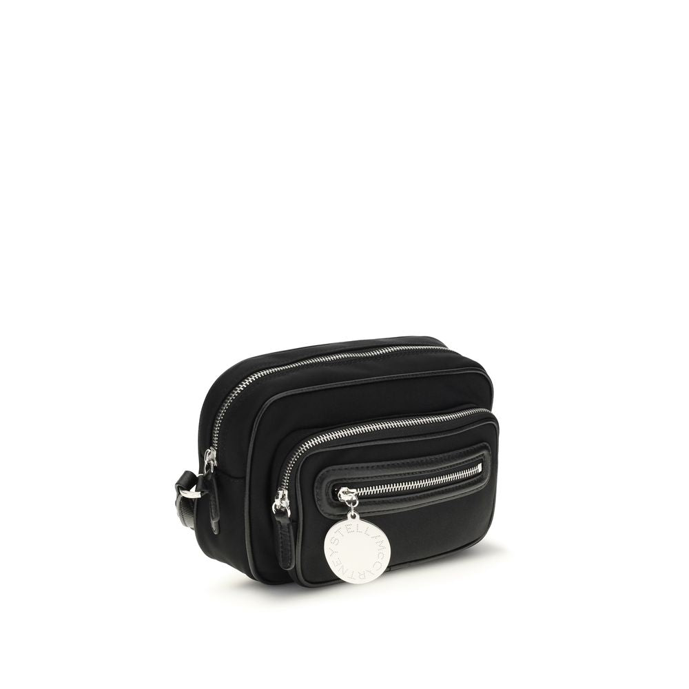 Shoulder Backpack by Stella McCartney for women in polyamide faux leather black & silver showcases a urban-chic Dartmoor Polyamide Faux Leather Shoulder Backpack design, featuring a secure zipper with urban-chic external-pockets and versatile shoulder-strap, handle, backpack-strap & adjustable-strap.