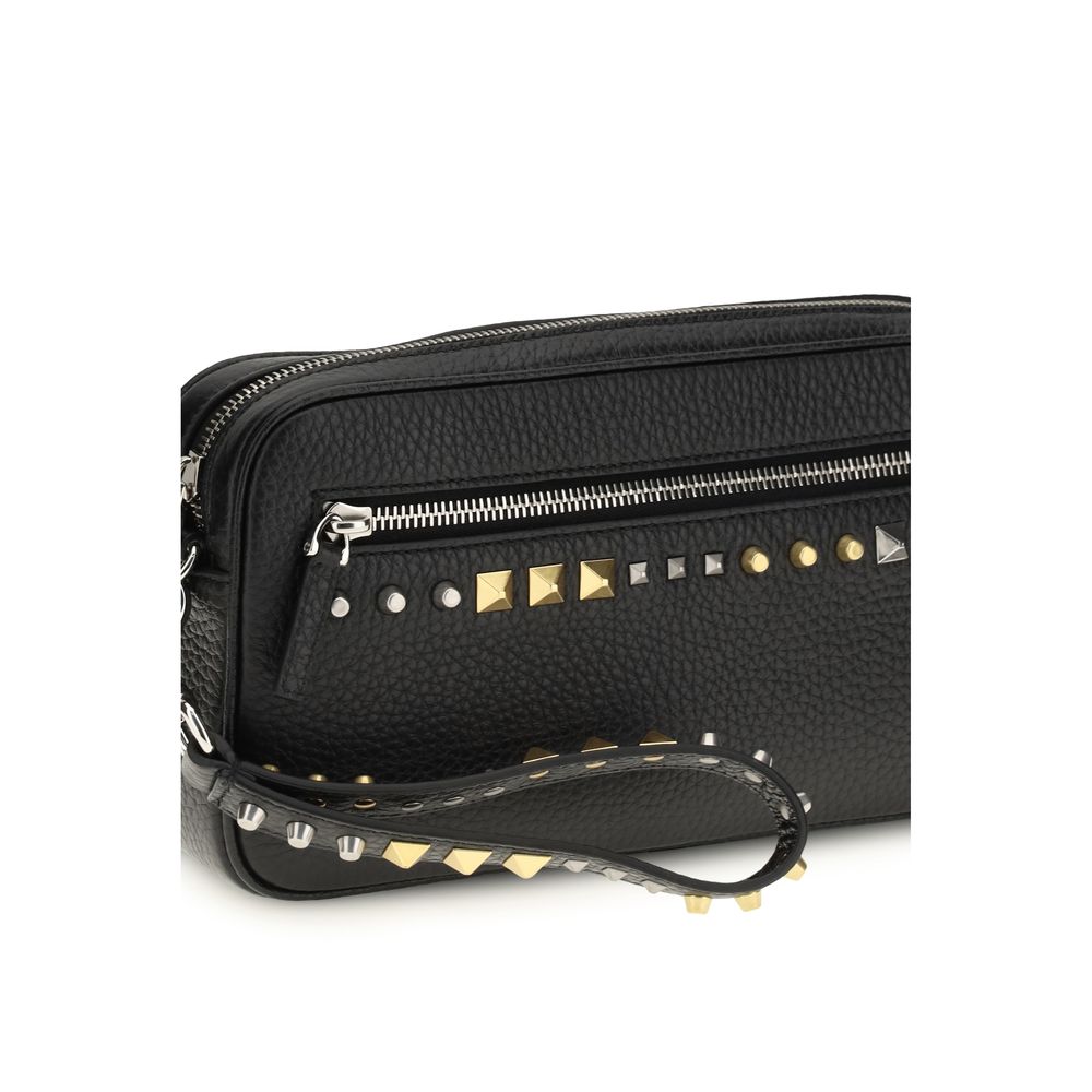 Clutch Handbag by Valentino Garavani for men in bos taurus calf leather black & signature showcases a sculptural silhouette, featuring a secure zipper, ample built-in-compartments & cardholder, and versatile handle for a sculptural finish.