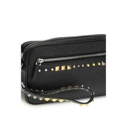 Clutch Handbag by Valentino Garavani for men in bos taurus calf leather black & signature showcases a sculptural silhouette, featuring a secure zipper, ample built-in-compartments & cardholder, and versatile handle for a sculptural finish.