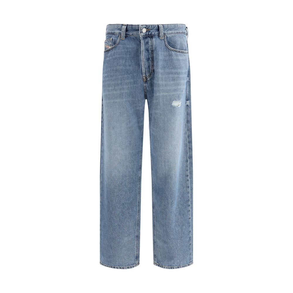 Jeans by Diesel for men in organic cotton denim blue presents a refined pantology silhouette, artfully defined by a refined pantology tapered-leg, relaxed-fit & regular-fit, long, and a sophisticated mid rise.