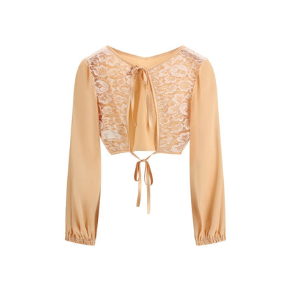 Blouse by Kristina Ti for women in silk polyamide & cotton orange showcases a sublime silhouette, artfully detailed with a sublime v-neck halter neckline and for a sophisticated, sublime finish.