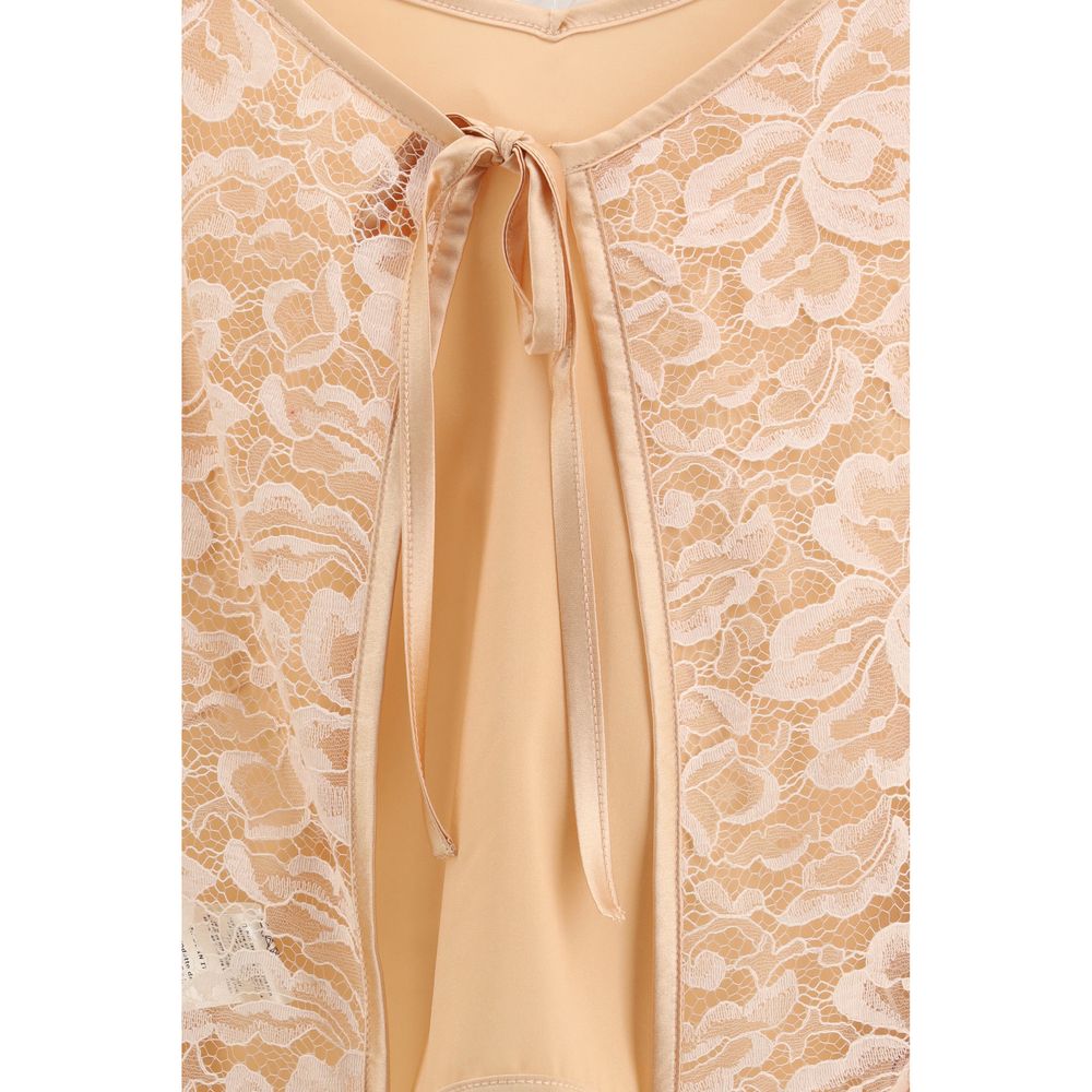 Blouse by Kristina Ti for women in silk polyamide & cotton orange showcases a sharp silhouette, elegantly detailed with a sharp and sharp .