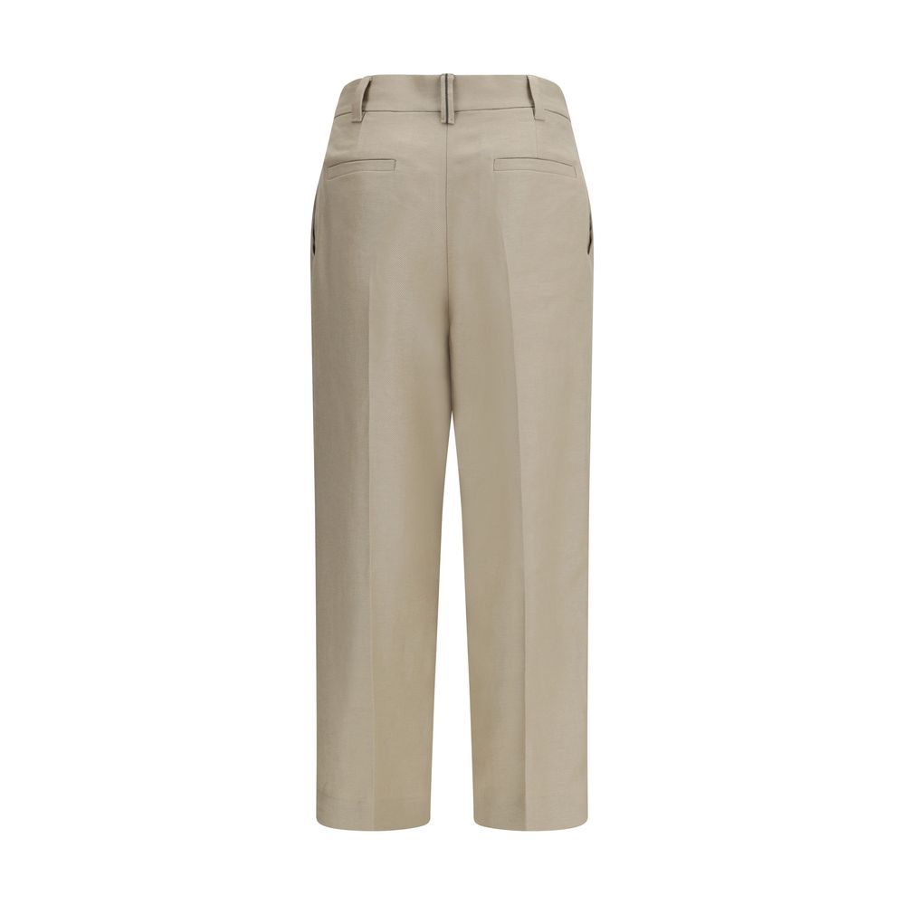 Trousers by Brunello Cucinelli for women in linen beige presents a smart silhouette, meticulously detailed with a smart regular-fit & wide, a smart long, and a smart .