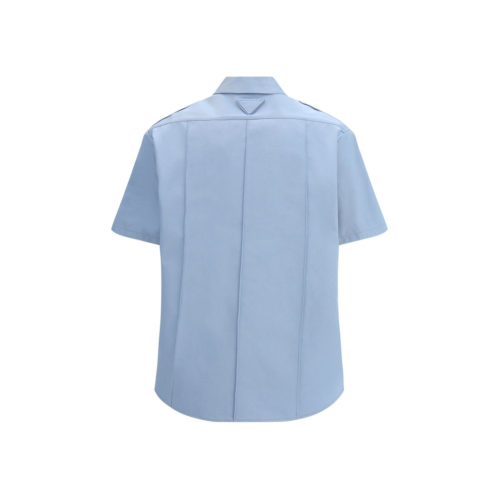 Shirt by Prada for women in cotton blue, featuring a nuanced and nuanced for a sophisticated finish.