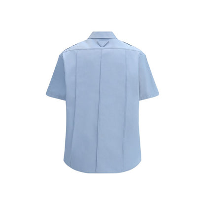 Shirt by Prada for women in cotton blue, featuring a nuanced and nuanced for a sophisticated finish.
