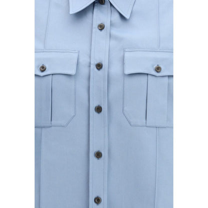 Shirt by Prada for women in cotton blue presents a discerning silhouette, showcasing a sophisticated and for a truly discerning finish.