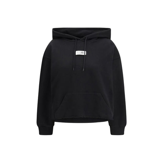 Sweatshirt Hoodie by MM6 for women in cotton black, white & signature showcases a city-ready silhouette, artfully detailed with a signature hooded neckline and long-sleeve for a city-ready finish.