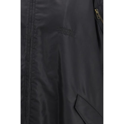 Cape by MM6 for women in polyamide twill black presents a cosy chic silhouette, meticulously detailed with distinctive lightweight & pockets and a sophisticated for a truly cosy chic finish.