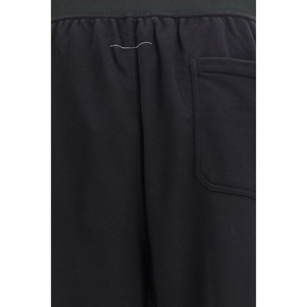 Sweatpants by MM6 for men in cotton black & white features an contemporary straight-leg, athletic, relaxed-fit & regular-fit with a long and , showcasing for a contemporary finish.