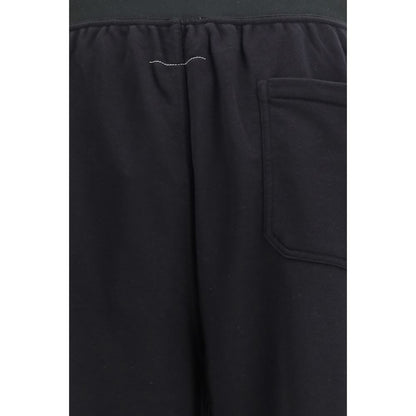 Sweatpants by MM6 for men in cotton black & white features an contemporary straight-leg, athletic, relaxed-fit & regular-fit with a long and , showcasing for a contemporary finish.