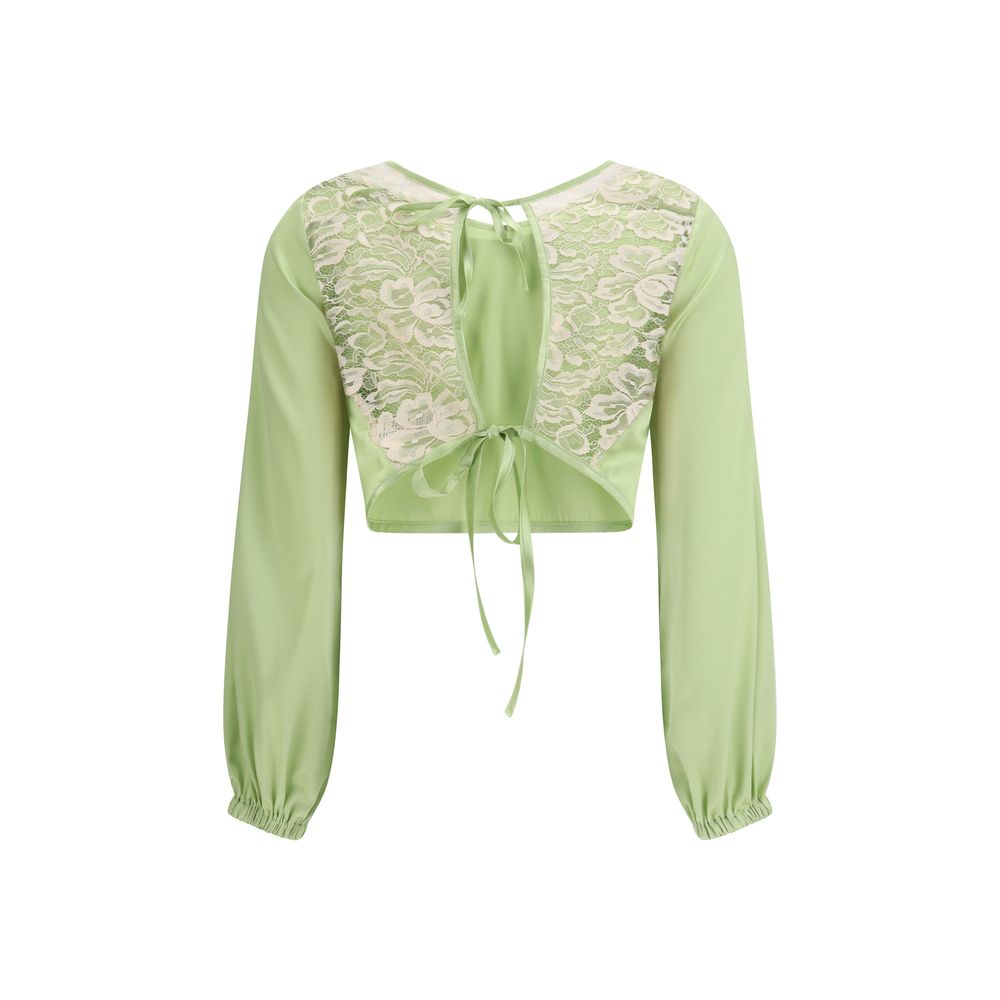 Blouse by Kristina Ti for women in silk polyamide & cotton bicolour showcases a sleek silhouette, elegantly detailed with a sleek v-neck halter neckline and for a sleek finish.