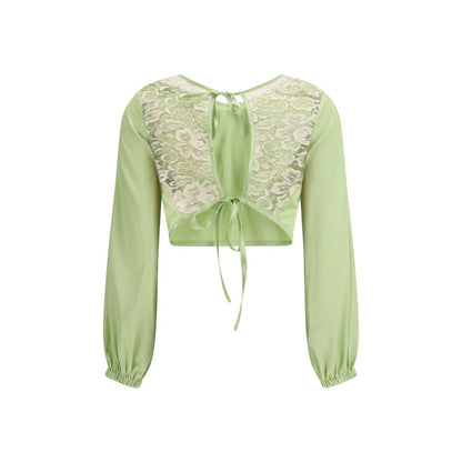 Blouse by Kristina Ti for women in silk polyamide & cotton bicolour showcases a sleek silhouette, elegantly detailed with a sleek v-neck halter neckline and for a sleek finish.