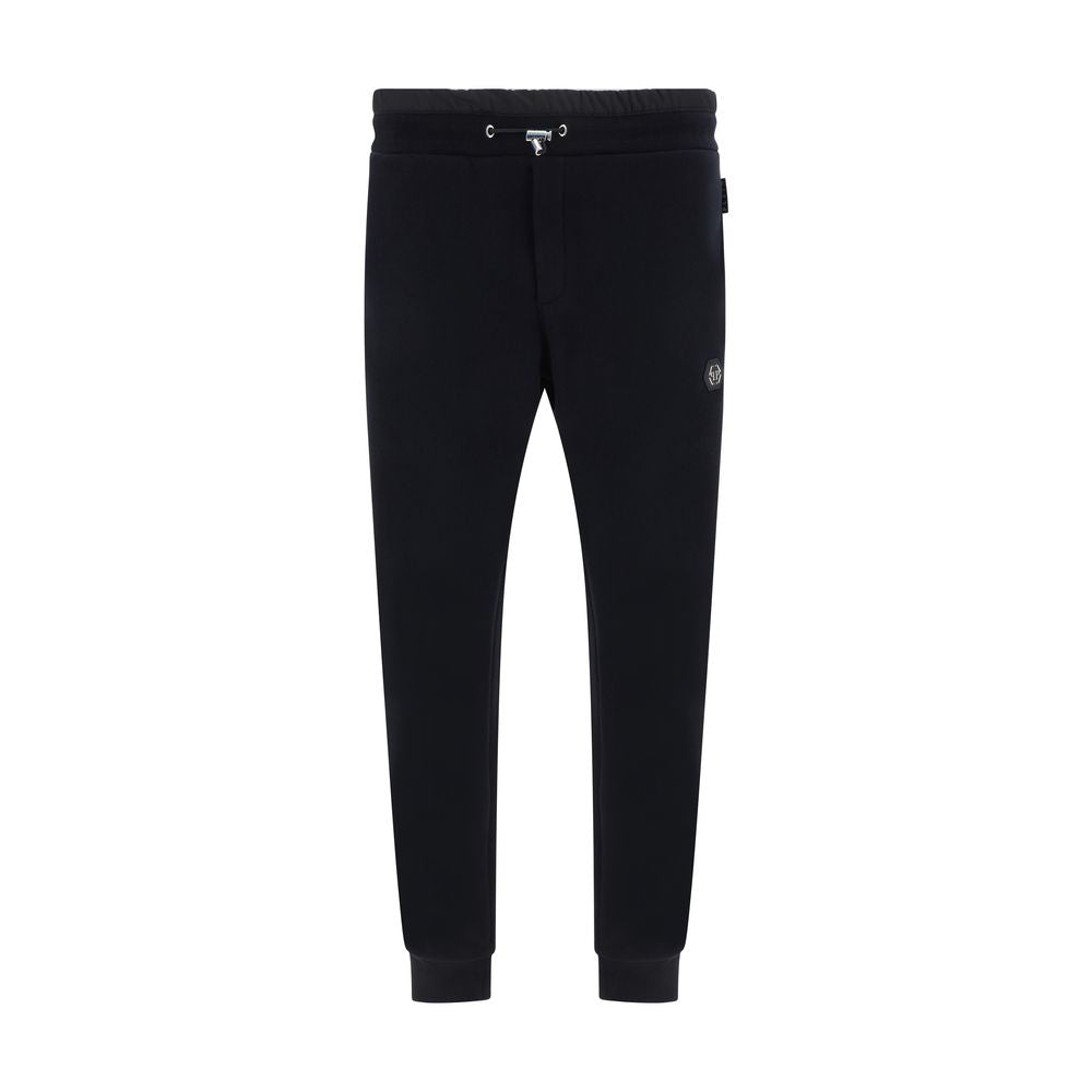 Jogger Sweatpants by Philipp Plein for men in cotton black features a contemporary silhouette with , a contemporary , long hem, and for a premium, high-performance aesthetic.