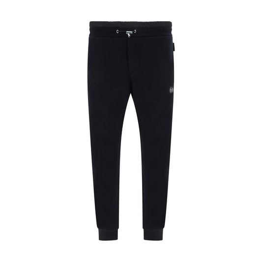 Jogger Sweatpants by Philipp Plein for men in cotton black features a contemporary silhouette with , a contemporary , long hem, and for a premium, high-performance aesthetic.