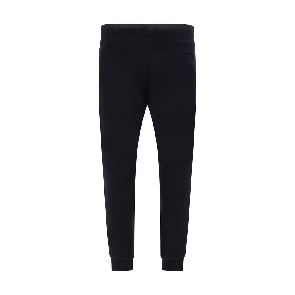 Jogger Sweatpants by Philipp Plein for men in cotton black features a versatile silhouette, integrating performance with a versatile , long, and comfortable .