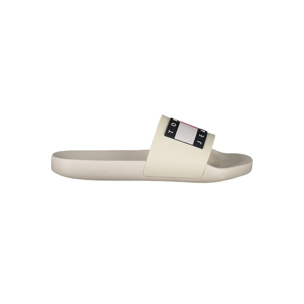 Sandals by Tommy Hilfiger for men in polyurethane and beige presents a sculptural silhouette, showcasing the signature style of the Men's Polyurethane Sandals with a sculptural and sculptural .