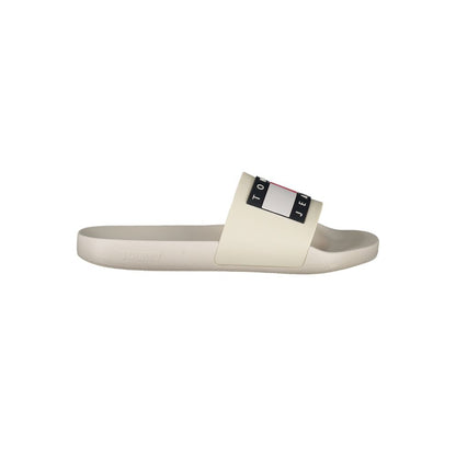 Sandals by Tommy Hilfiger for men in polyurethane and beige presents a sculptural silhouette, showcasing the signature style of the Men's Polyurethane Sandals with a sculptural and sculptural .