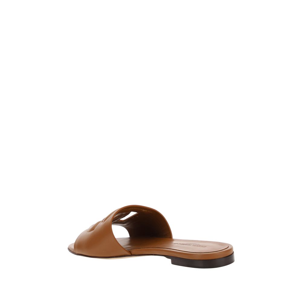 Flat Sandals by Dolce & Gabbana for women in bos taurus calf leather brown features an architectural design from the Women's Bos Taurus Calf Leather Flat Sandals collection, defined by a architectural flat and for a architectural finish.