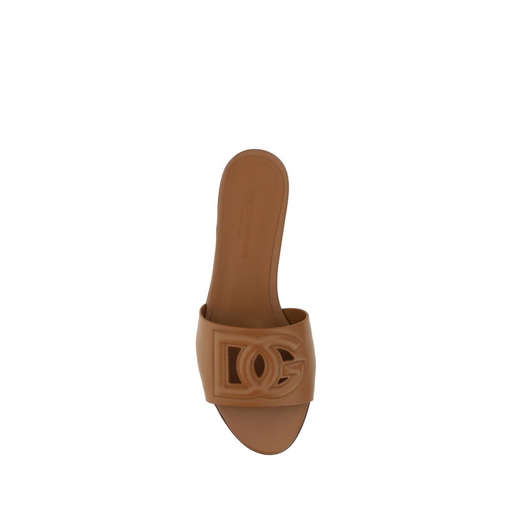 Flat Sandals by Dolce & Gabbana for women in bos taurus calf leather brown showcases a sculptural silhouette as Women's Bos Taurus Calf Leather Flat Sandals, defined by a sculptural flat and sculptural for a sculptural look.