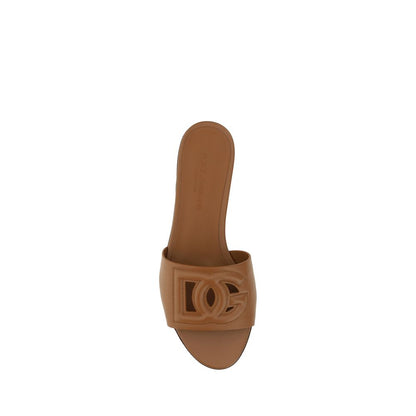 Flat Sandals by Dolce & Gabbana for women in bos taurus calf leather brown showcases a sculptural silhouette as Women's Bos Taurus Calf Leather Flat Sandals, defined by a sculptural flat and sculptural for a sculptural look.