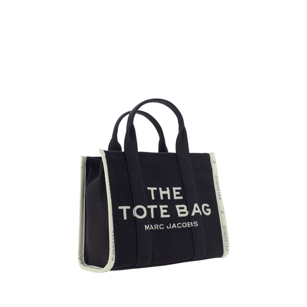This Medium Tote Handbag by Marc Jacobs for women in cotton polyester and black, jacquard, signature, monogram & print presents a sculptural silhouette featuring a secure zipper, ample , and versatile shoulder-strap, handle & adjustable-strap for a sculptural finish.