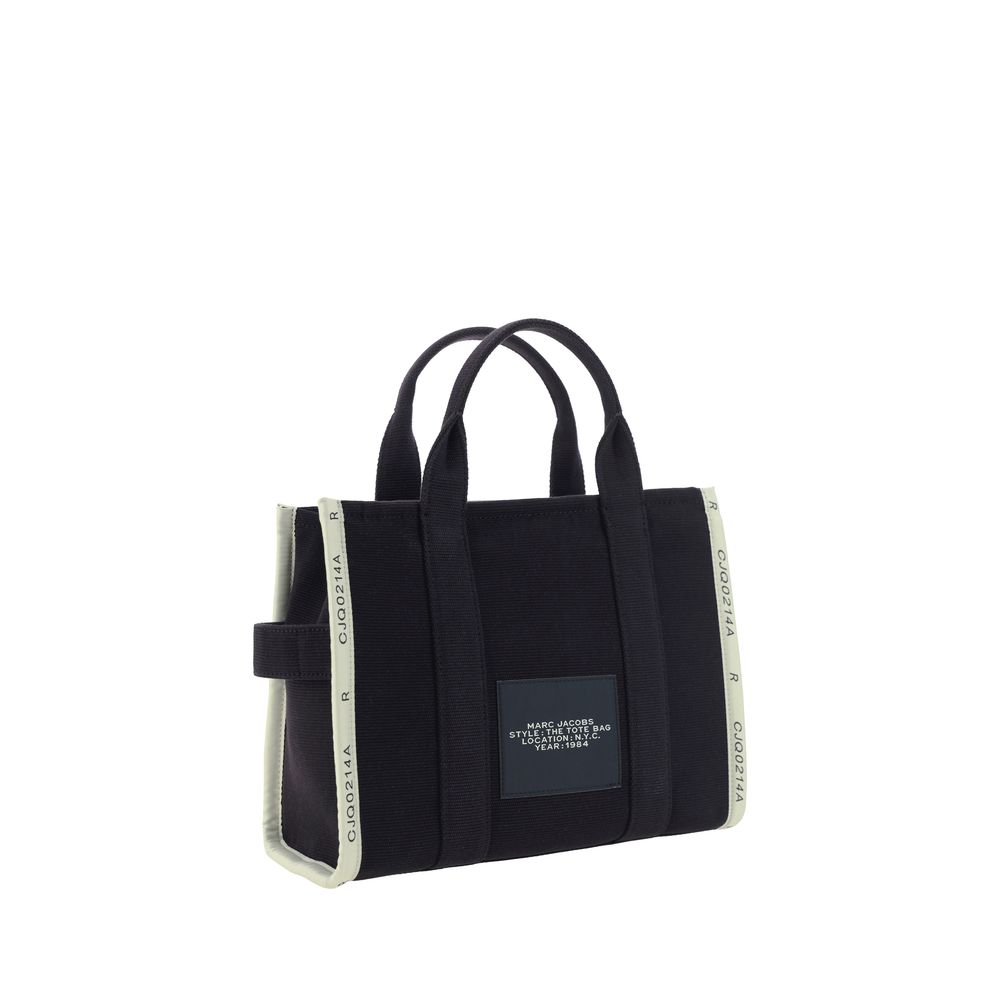 Medium Tote Handbag by Marc Jacobs for women in cotton polyester black, jacquard, signature, monogram & print features a exquisite silhouette, showcasing a secure zipper and exquisite with versatile shoulder-strap, handle & adjustable-strap for a exquisite finish.
