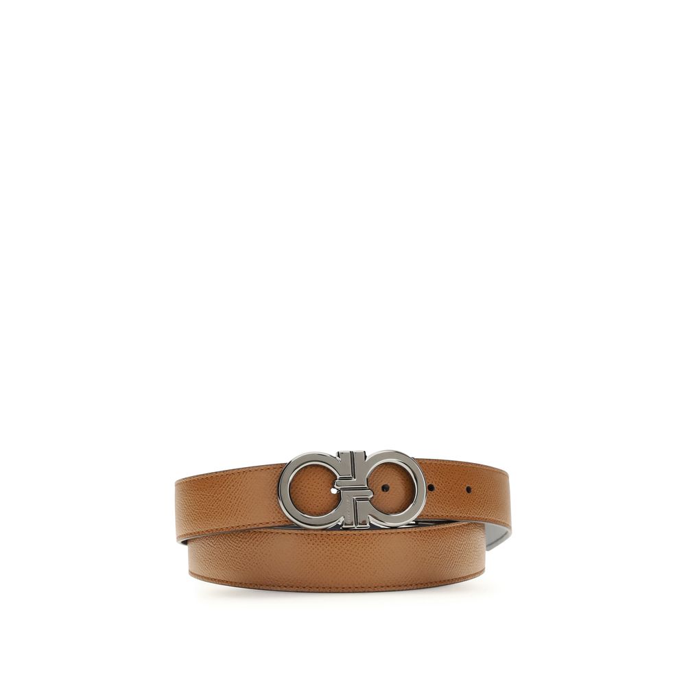 Belt by Ferragamo for men in bos taurus suede calfskin leather bicolour & brown features an artisanal finish, elegantly showcasing the signature style and artisanal craftsmanship of the Gancini Bos Taurus Suede Calfskin Leather Belt design.