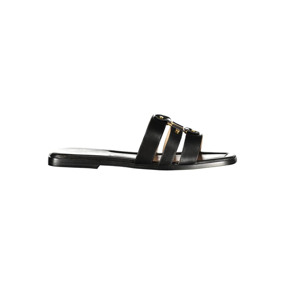 Flat Sandals by Twinset for women in polyurethane leather black features an statuesque silhouette from the Women's Polyurethane Leather Flat Sandals collection, showcasing a statuesque flat and elegant .