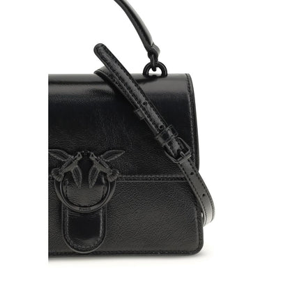 Mini Shoulder Bag by PINKO for women in goatskin leather & cotton black features a enviable silhouette, showcasing a secure zipper, magnetic, buckle & button, ample , and enviable shoulder-strap & handle for a enviable finish.