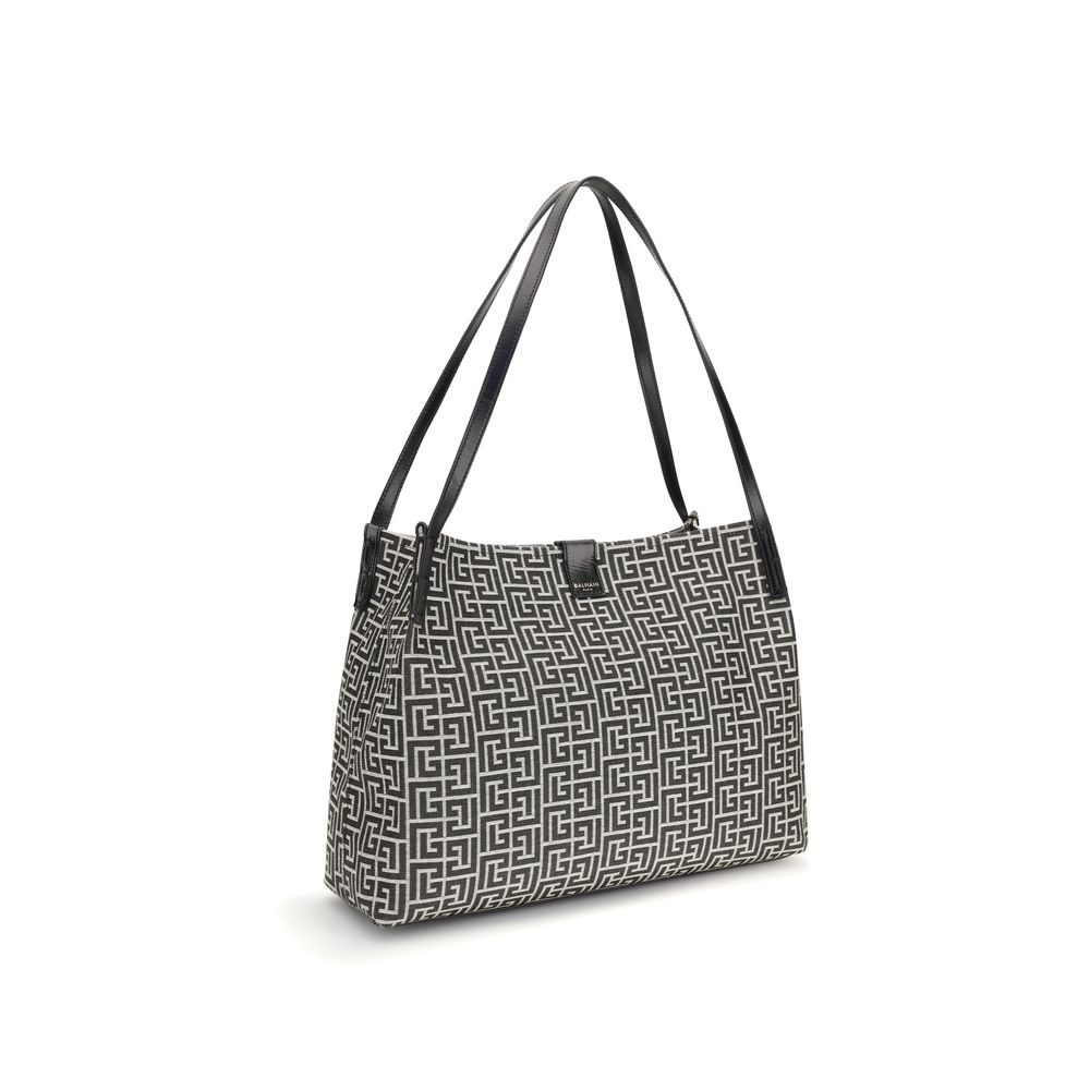 Medium Tote Shoulder Bag by Balmain for women in polyamide polyurethane polyester cotton black features a effortless chic silhouette with a secure snap & button, ample , and versatile adjustable-strap for a effortless chic finish.