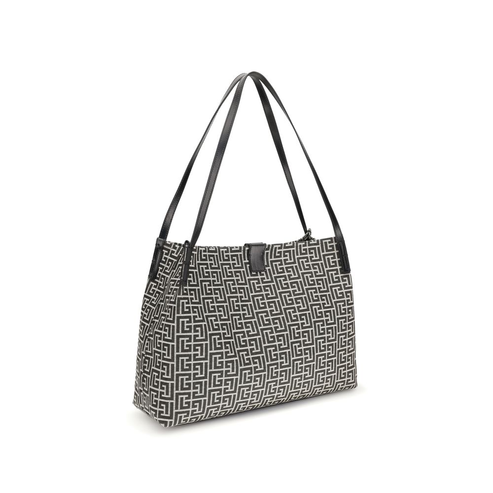 Medium Tote Shoulder Bag by Balmain for women in polyamide polyurethane polyester cotton black features a enviable silhouette, showcasing a secure snap & button, ample , and enviable adjustable-strap for a enviable finish.
